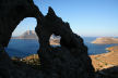 Kalymnos - The 'eye' in the arete at dawn showing the wider sweep of the bay with Telendos island in the background