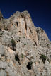 Kalymnos - close inspection of the crag behind Emborios shows that it includes sections of the Kastri built from dressed stone and cave openings now used by goats