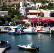 Kalymnos - looking across Vathy harbour to the two mainstays of small harbours, fishing boats and the taverna