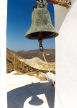 Nisyros - looking through the bell tower at Stavros monastery into the caldera of the volcano with the sulphur-coloured  'Alexandros' explosion vent prominent