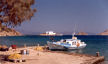 Symi - fishing quay in Skoumisa Bay below Agios Filimonos with Emilianos behind