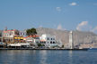 Symi - view across the harbour to the  'clock corner' from outside the Symi Visitor office