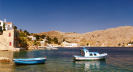 Symi - increasing numbers of houses are being built and renovated towards Nimborio for locals, 'returnees' and visitors