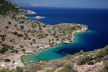 Symi - looking across Maroni Bay to the island monastery of Agios Emilianos